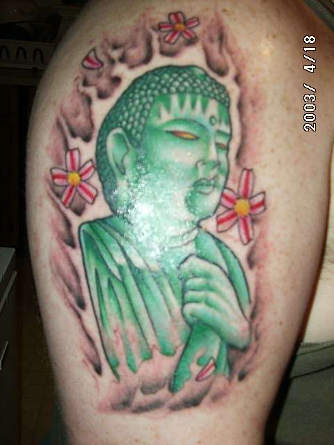 Greenstone buddha statue tattoo