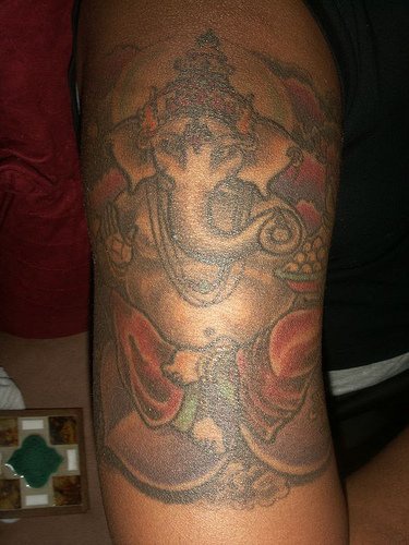 Coloured ganesha hindu tattoo