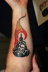 Shambala tattoo on arm