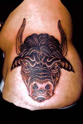 Old angry bull head tattoo