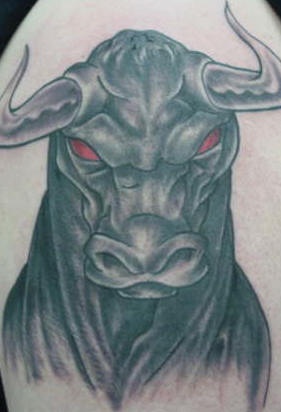 Red eyed angry bull tattoo