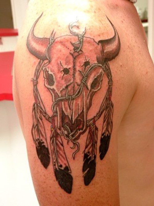 Native indian bull skull with feathers tattoo