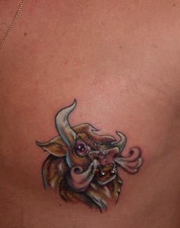 Cartoonish evil bull tattoo