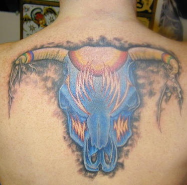 Blue bull head tattoo on back