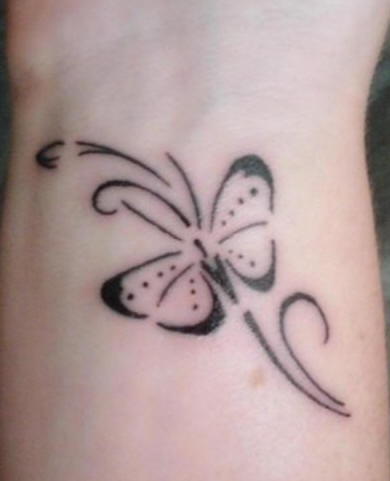 Butterfly wrist tattoo