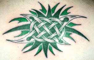 Green celtic tracery tattoo