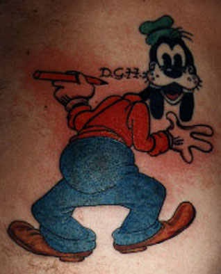 Goofy from cartoon tattoo in colour