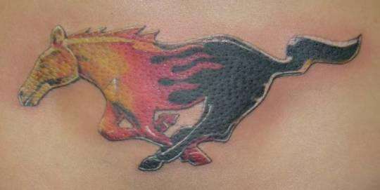 Mustang logo in flames tattoo
