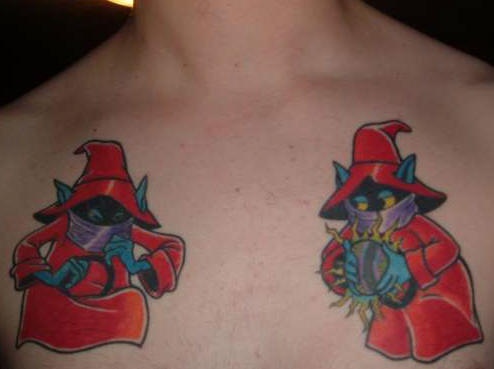 Cartoonish digimons on chest tattoo