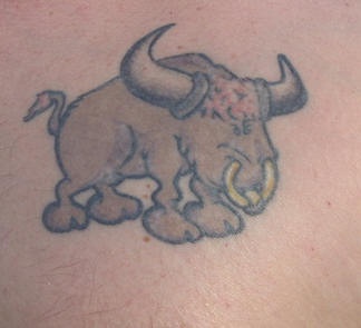 Cartoon bull tattoo