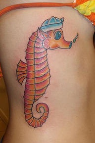 Cartoonish sailor seahorse tattoo