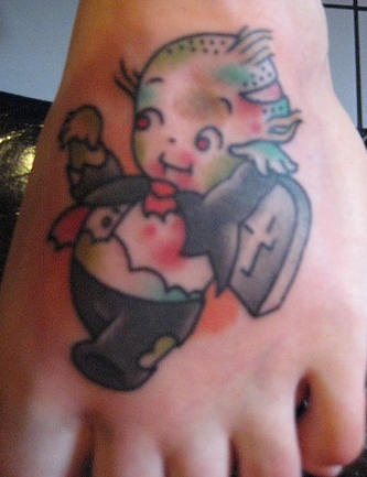 Cartoon zombie boy tattoo