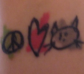 Peace love and cat coloured tattoo