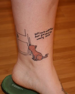 Red cat waiting by the door leg tattoo
