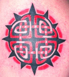 Red and black celtic sun tattoo