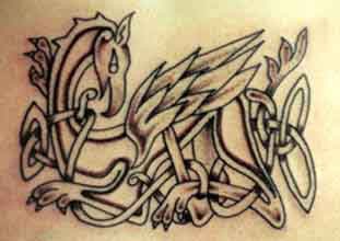 Celtic pattern firebird tattoo