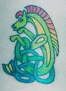 Celtic style horse fish tattoo