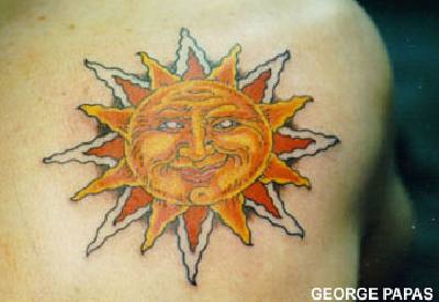 Smiling sun symbol tattoo