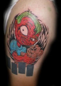 Crazy kid with bear tattoo in colour