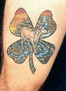 Shamrock with cow and giants causeway tattoo