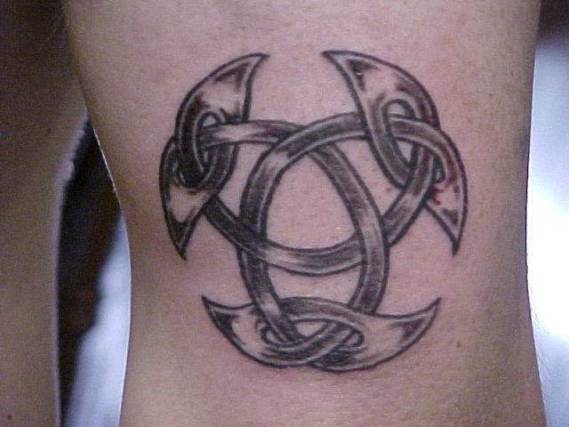Celtic trinity symbol black ink tattoo
