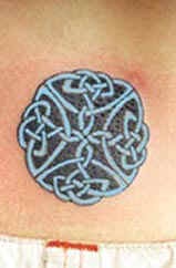 Blue celtic tracery tattoo