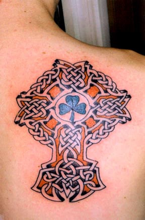 Clover in celtic cross tattoo