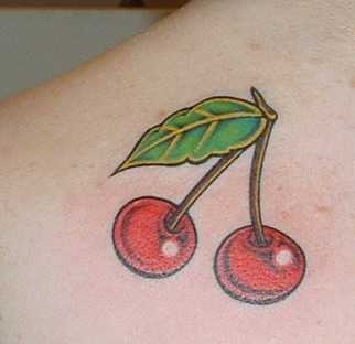 Realistic red cherry tattoo