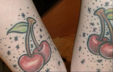 Cherry in stars tattoo