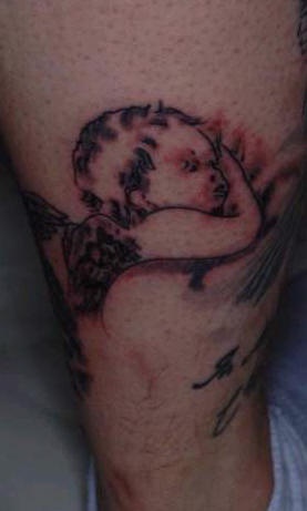 cherubino dormendo tatuaggio