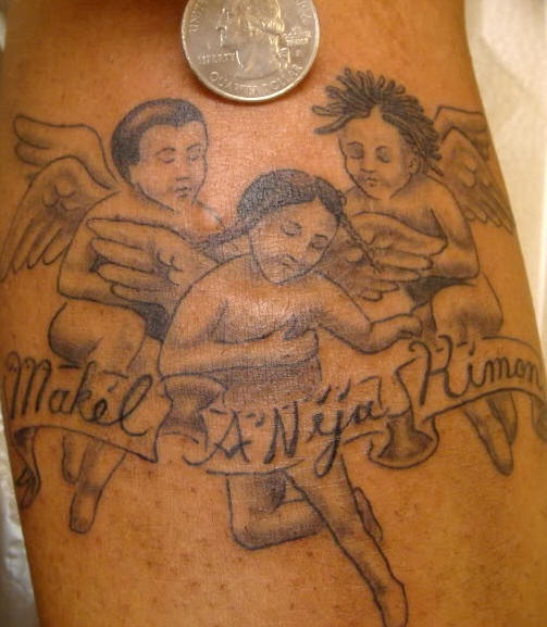 Three cherubs small black tattoo