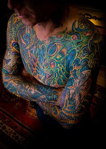 Colorful large chest tattoo