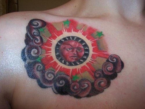 Red all-seeing eye  chest tattoo