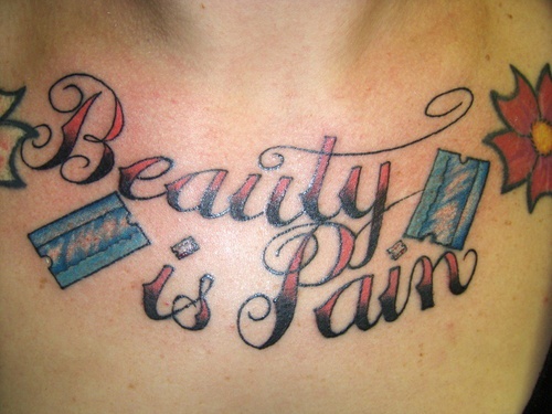 Beauty & pain chest tattoo