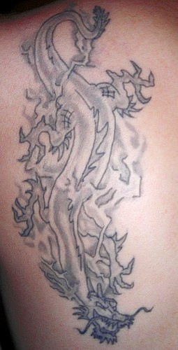 Diving chinese dragon black ink tattoo