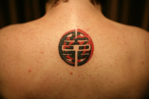 Red and black chinese symbol tattoo