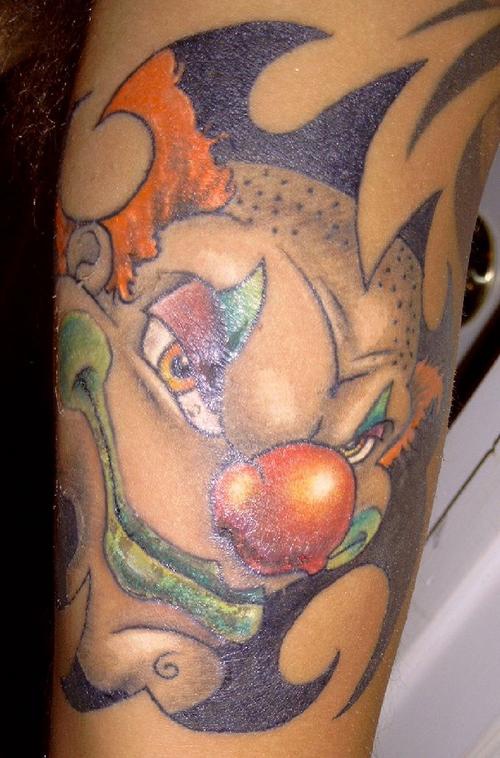 Crazy redhead clown tattoo