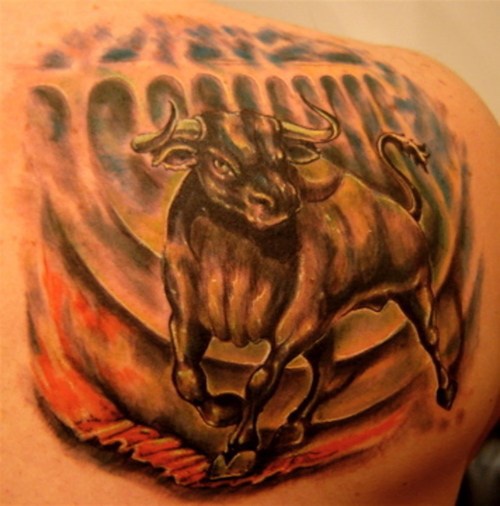 Corrida scene with bull tattoo