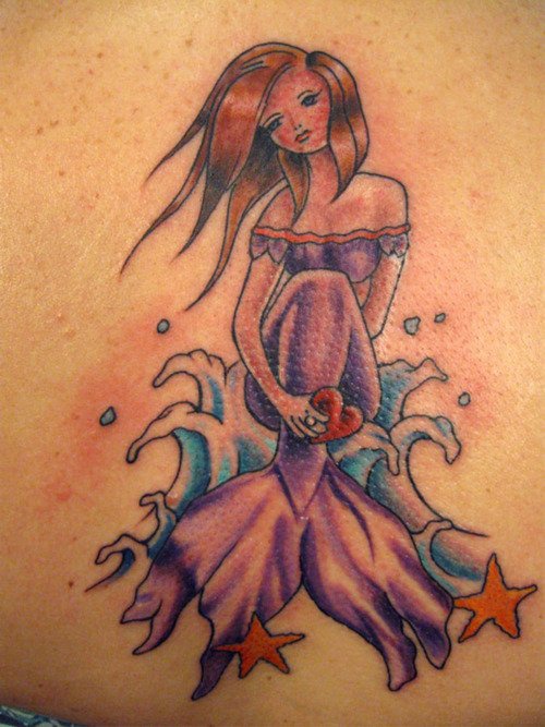 Colorful mermaid in dress tattoo