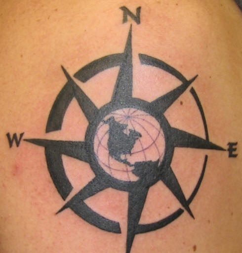 Compass symbol with globe tattoo