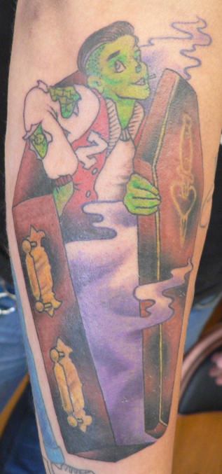 Tatuaje el chico-zombi en verde