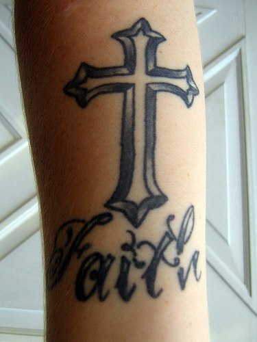 Faith text with cross tattoo
