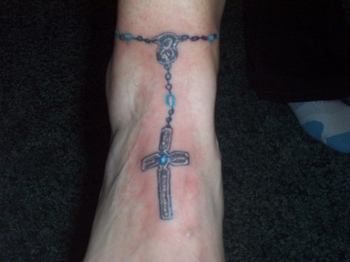 Armband tattoo with cross