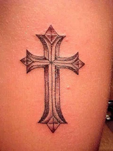 Geometric cross tattoo