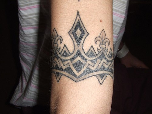 Crown armband tattoo