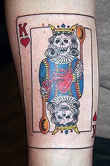 Skull king of hearts tattoo