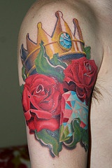 Golden crown diamond and roses on arm
