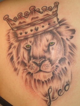 Leo the lion in crown tattoo