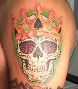Skull with crown of spades tattoo