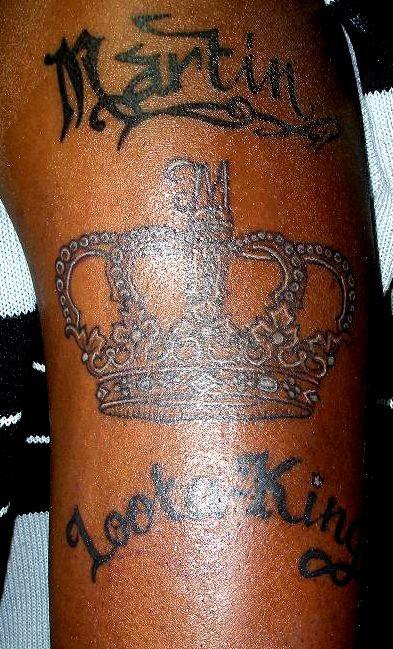 Krone mit Martin Luther King Tattoo Sieg oder Abfuhr